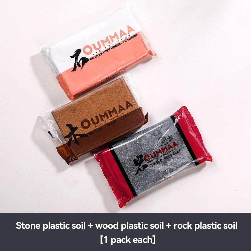 Three packs of OUMMAA air-dry modeling clay in pink, brown, and red packaging.