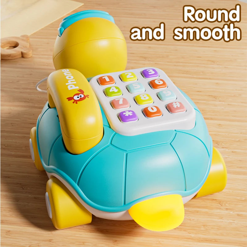 A yellow and blue musical crawling turtle toy with a phone keypad, designed for baby fun.
