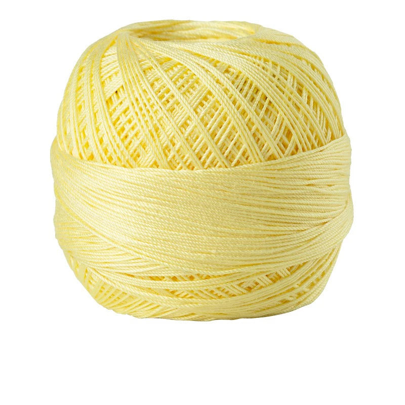 A ball of bright yellow 100% cotton crochet thread for tatting and embroidery.
