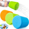 A collection of silicone pet shower heads in green, orange, and blue are shown spraying water.