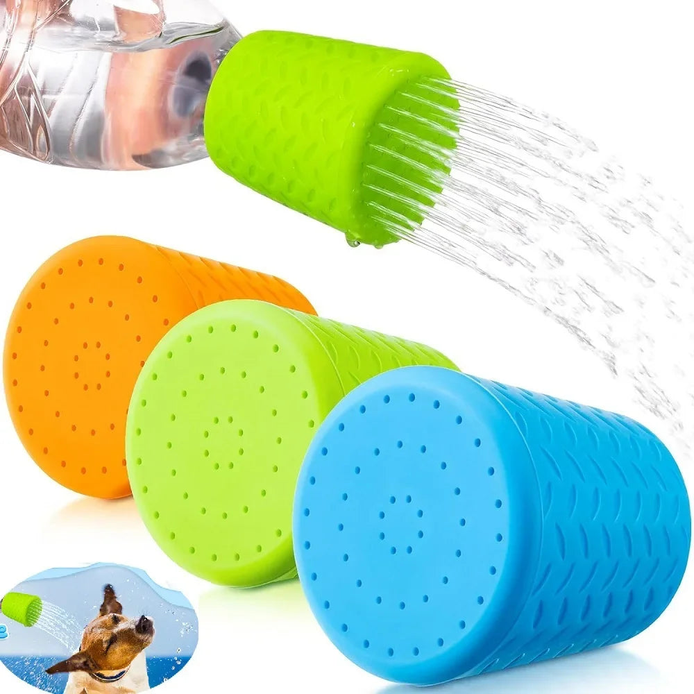 A collection of silicone pet shower heads in green, orange, and blue are shown spraying water.