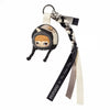 A blind box keychain featuring a character from the Hirono Mist-Walker series with a black and tan design.