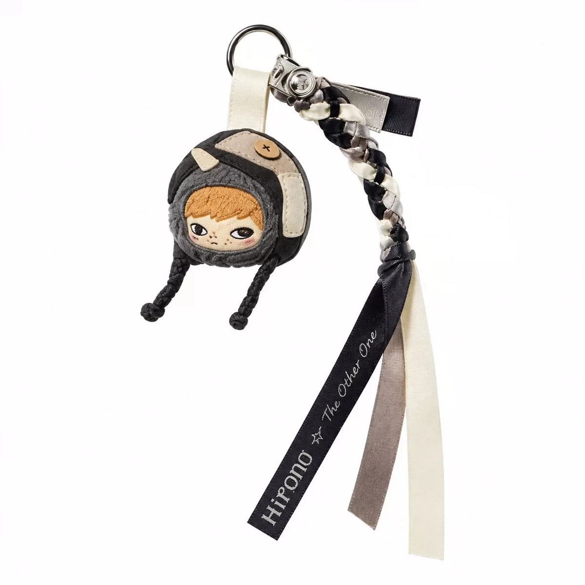 A blind box keychain featuring a character from the Hirono Mist-Walker series with a black and tan design.