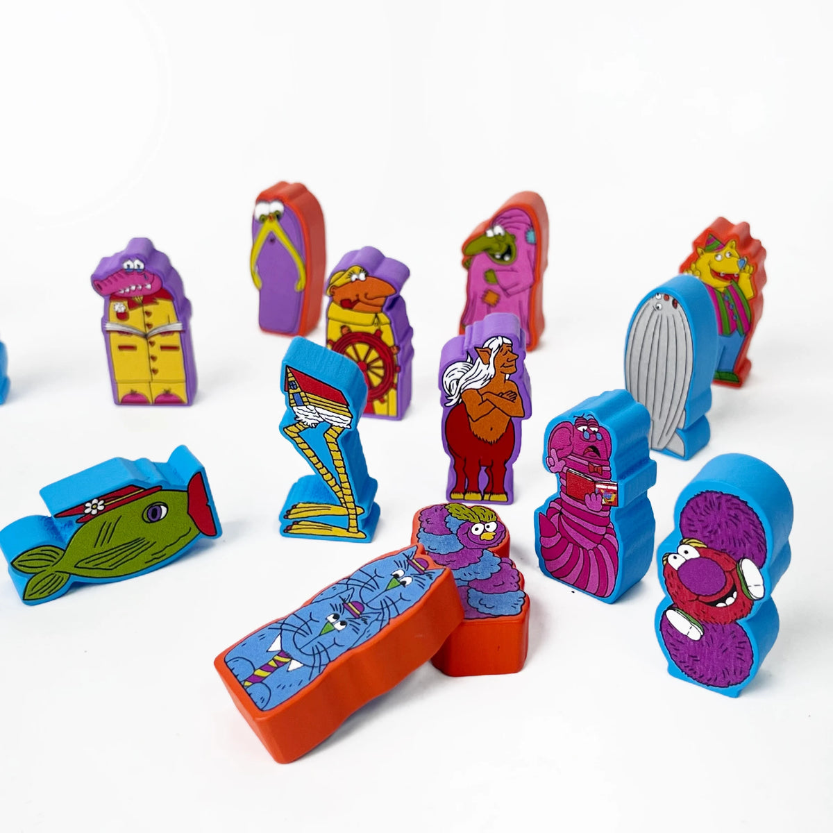 A collection of colorful wooden racing game pieces and components for a board game.