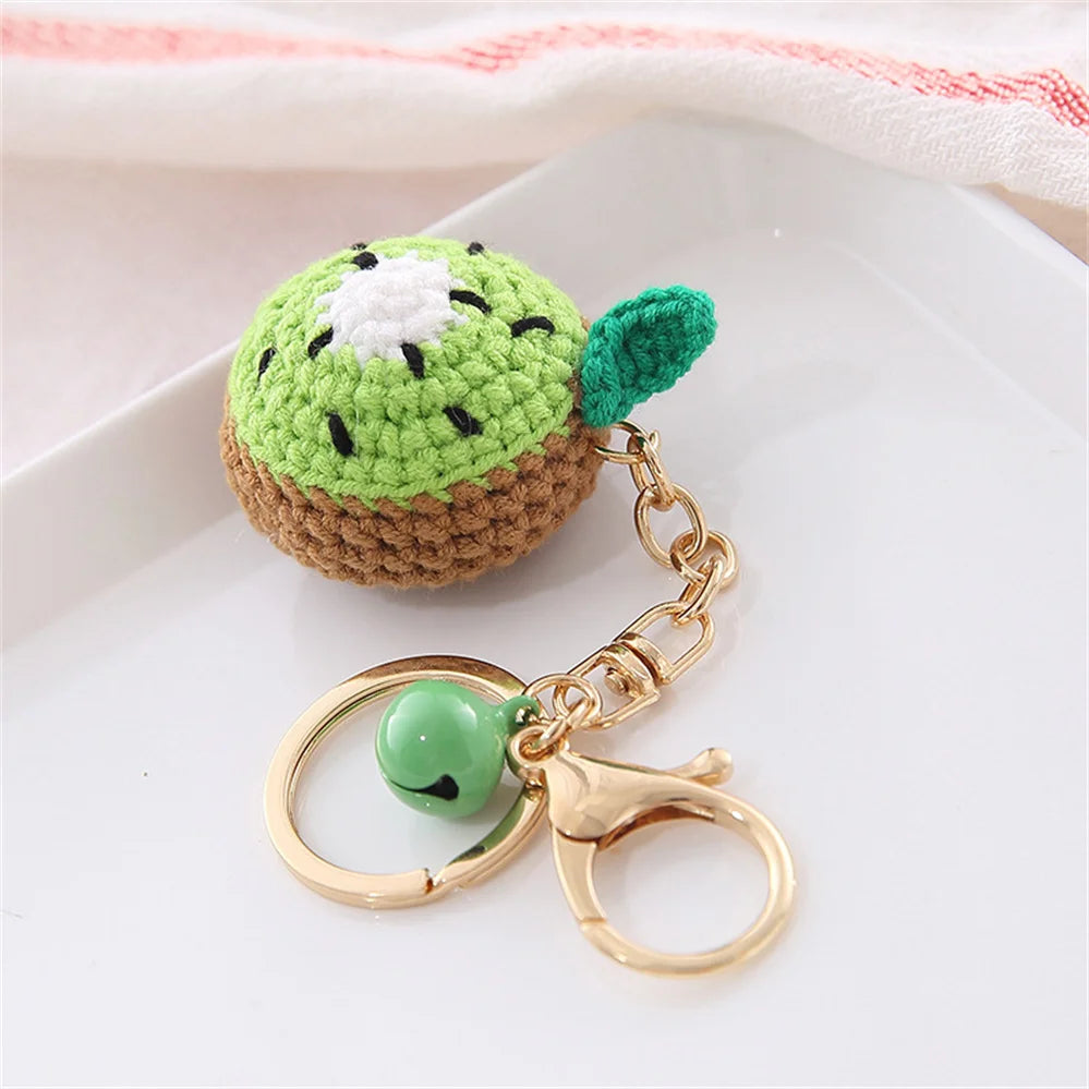 Handmade crochet avocado fruit keychain pendant with green skin and white center