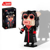 A black and pink pig mask puppet model building set featuring a pig character with large eyes and horns.