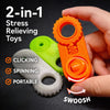 Orange and green 2-in-1 stress relieving toys are shown being held by a hand.