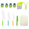 A set of colorful plastic knives and kitchen tools for kids including a yellow peeler, green knives, and a white cutting boar