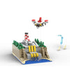 A 490-piece construction kit of a UFO robot and surrounding terrain built from LEGO-style building blocks.