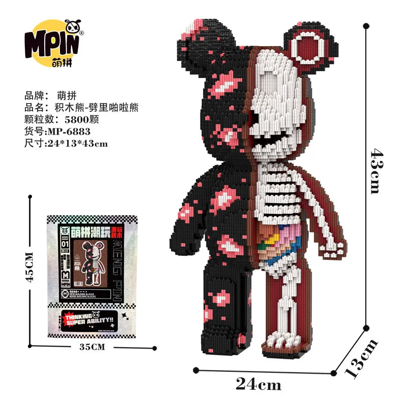 A black and white bear figure made of micro building blocks, featuring red accents and a circular design.