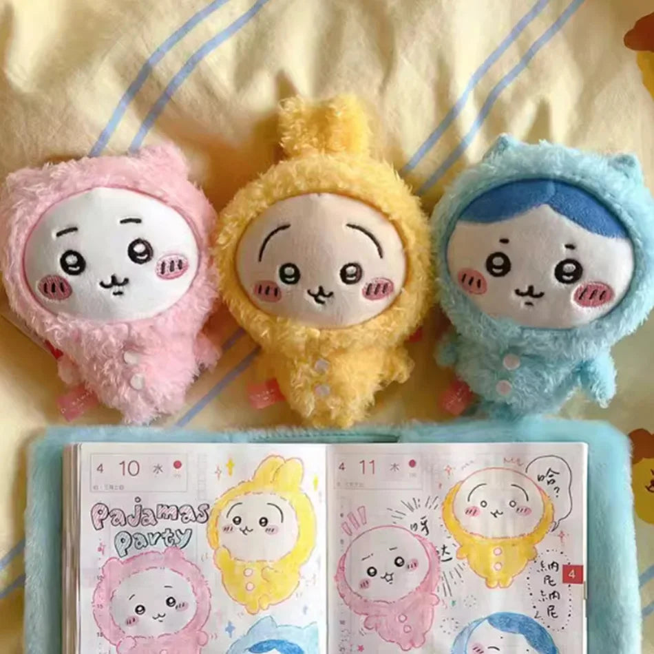 Three adorable Usagi Hachiware plush keychains in pink, yellow, and blue with a pajama theme