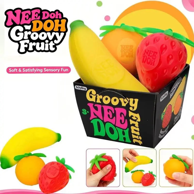 A set of three squishy fidget toys shaped like a strawberry, banana, and orange for sensory play.