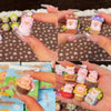 A collection of Lulu the Piggy Garden Series blind box figurines in various colors and packaging.