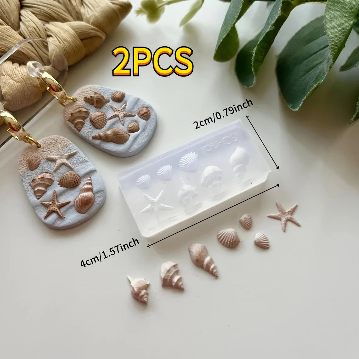 Two sets of silicone molds featuring starfish and seashell shapes for crafting