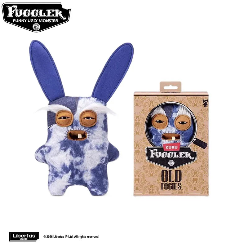 A plush toy of a monster with blue ears and white fur, packaged in a cardboard box.
