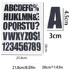 A sheet of DIY iron-on heat transfer patches showing the alphabet and numbers in black ink with corresponding measurements.