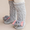 Gray plush baby knee-high socks with pink elephant ears and a knitted cuff.