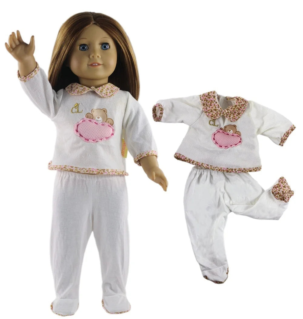 A doll wearing a white casual outfit set with pink accents and a floral collar.