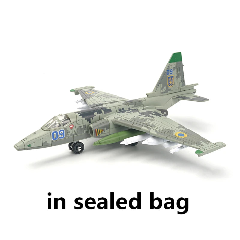 A detailed military model airplane in camouflage paint is shown in a sealed bag.
