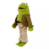 A plush toy of a green frog dressed in brown clothing.