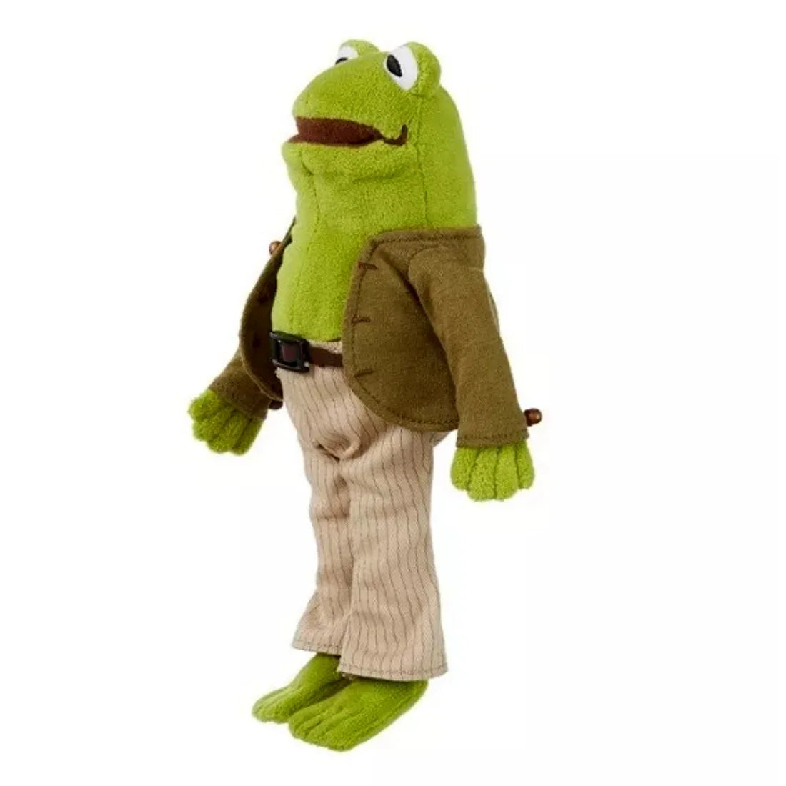 A plush toy of a green frog dressed in brown clothing.