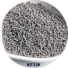A pile of small, round, gray glass seed beads is shown in a white bowl.