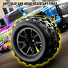 Close-up of an anti-slip and wear-resistant tire mounted on a blue and purple RC monster truck.