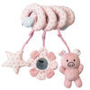 Un set de miroirs-rattles roses avec un porc et une forme d'étoile pour bébés