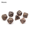 A set of coppery skull metal polyhedral dice used for tabletop role-playing games