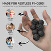 Soft sensory silicone massage balls with magnetic cores shown in a hand, designed to limit bad habits and relieve stress.