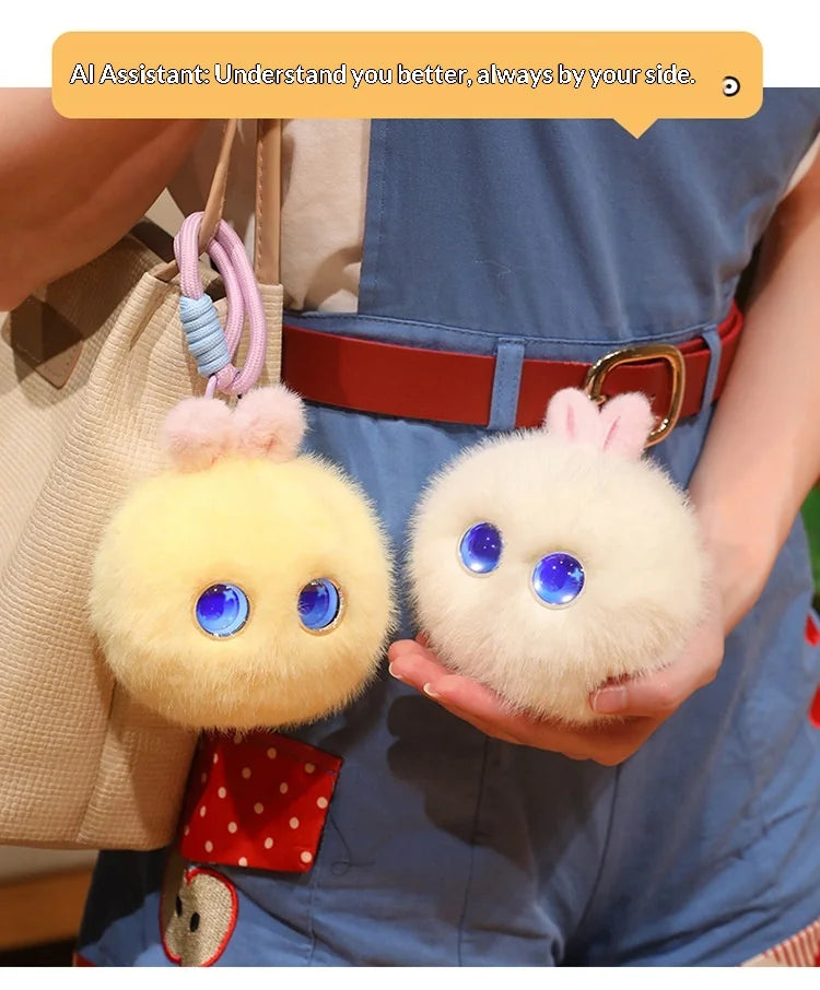 A fluffy white rabbit plush pendant with blue eyes is held by a person wearing a blue apron.
