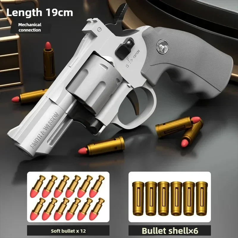 A white spring-powered revolver dart blaster with a gray grip and six gold bullet shells is shown on a dark surface.