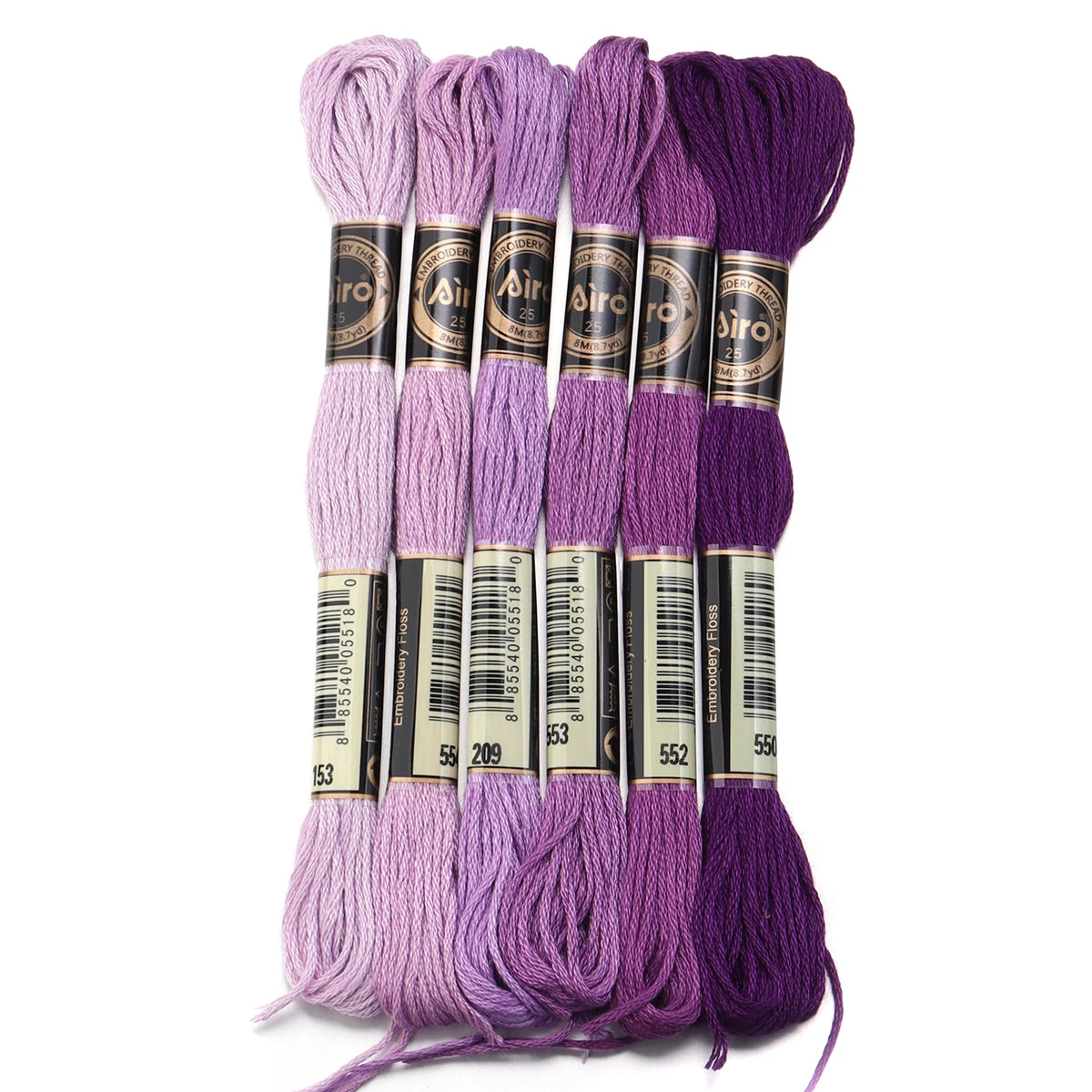 A set of six skeins of vibrant embroidery thread in various shades of purple and violet for cross stitch and DIY crafts
