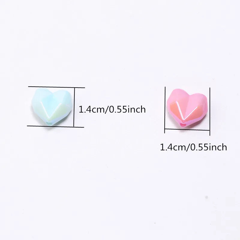 Two shiny heart-shaped acrylic beads, one light blue and one pink, shown with size measurements.
