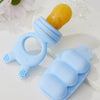 A set of blue silicone fruit food feeders and a mold with fruit shapes on a white surface.