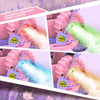 A pink remote control off-road car is shown with colorful gradient spray lights and DIY stickers in a purple floral setting.