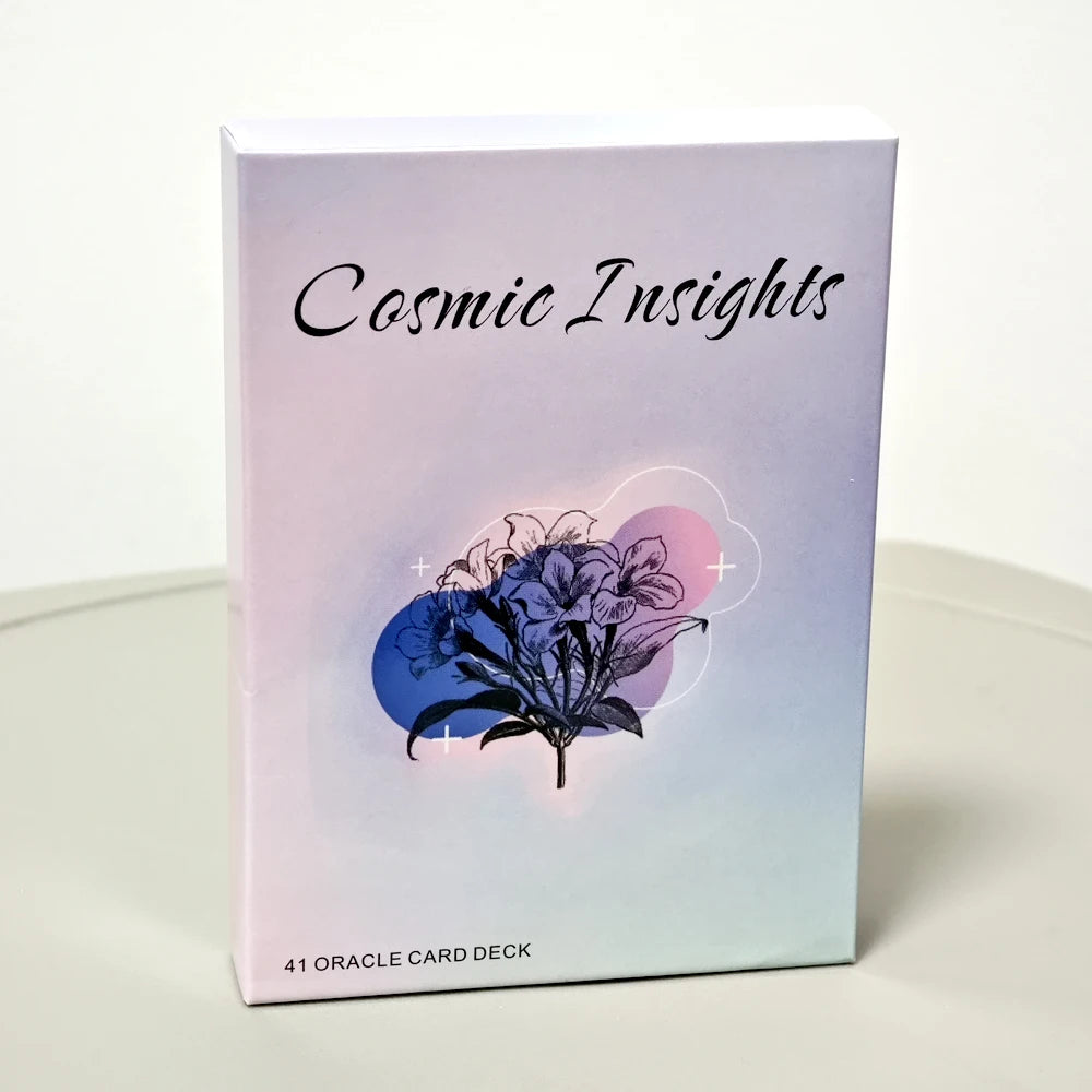 A box of Cosmic Insights Oracle Deck featuring a purple and pink gradient background with a dark floral illustration.