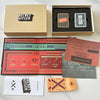 A collection of Secret Hitler card game components including a box, a game box, and various rule cards.