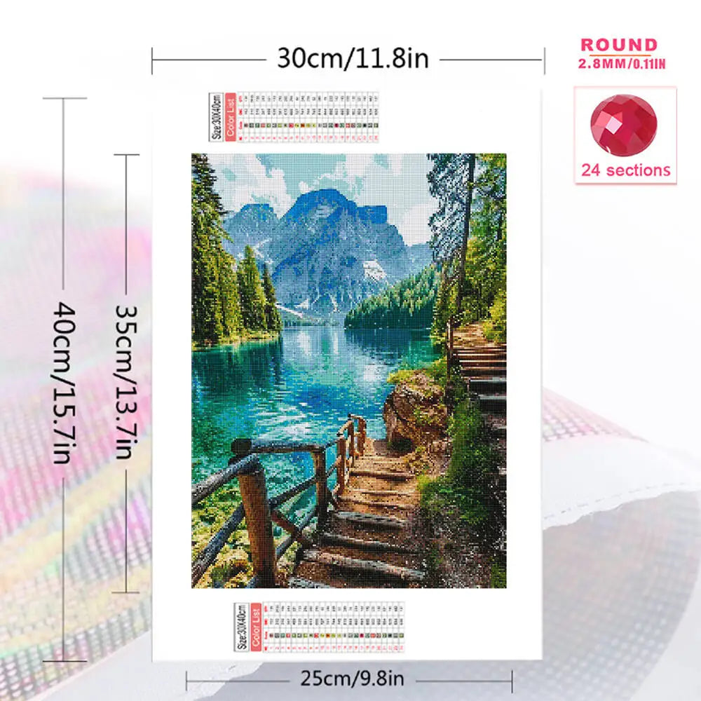 Diamond painting kit featuring a scenic mountain lake landscape with trees and a wooden walkway.