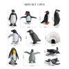 A mini set of 11 realistic ocean animal figurines including a whale, shark, dolphin, turtle, and penguin.