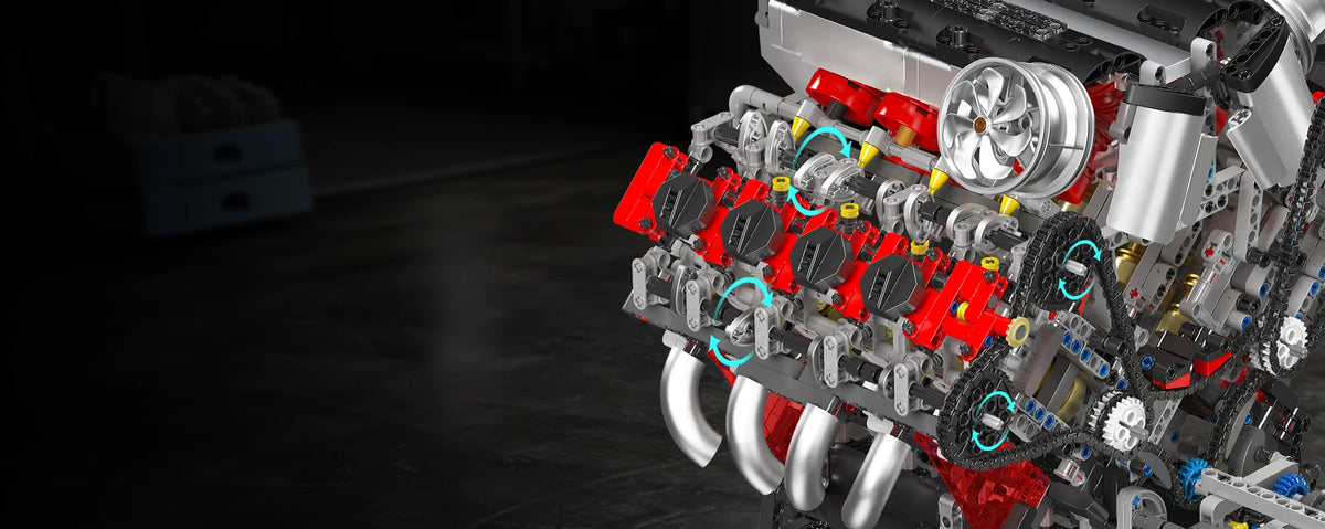 Close-up view of a detailed motorized V8 supercar engine building kit with various components and tools.