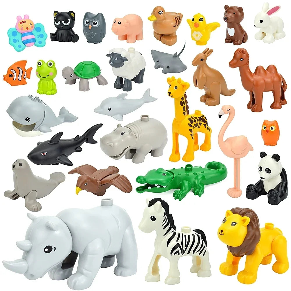 A collection of various zoo animal building blocks and figures in different colors and styles.