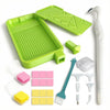 A complete diamond painting accessory kit featuring a green tray, various tools like tweezers and brushes, and iridescent til