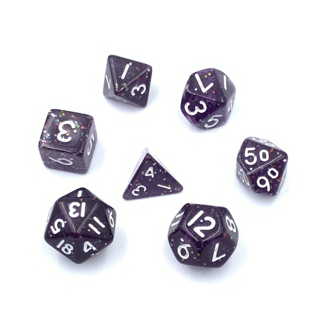 A collection of seven mini polyhedral dice showing various numbers and symbols on a white background.