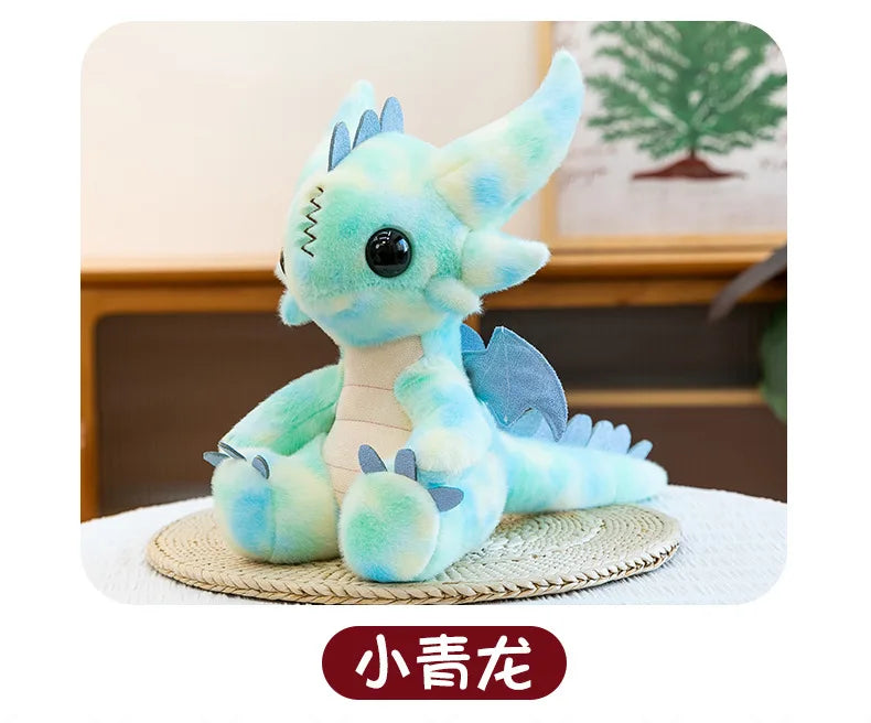 A light blue Toothless dragon plush toy with large eyes and soft features sitting on a woven mat.