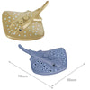 A set of marine animal building blocks including a shark, octopus, and whale in light yellow and blue colors.