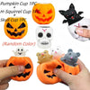 A collection of Halloween squeeze stress balls including pumpkin and skull shapes.