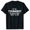 Black t-shirt with white text that reads I'm the youngest the rules don't apply to me
