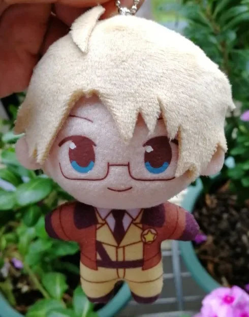 A plush keychain set featuring three characters Arthur, Alfred, and Wang Yao with light blonde hair.