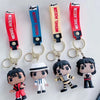 A set of Michael Jackson music icon keychains featuring various characters and names on colorful metal buckles.